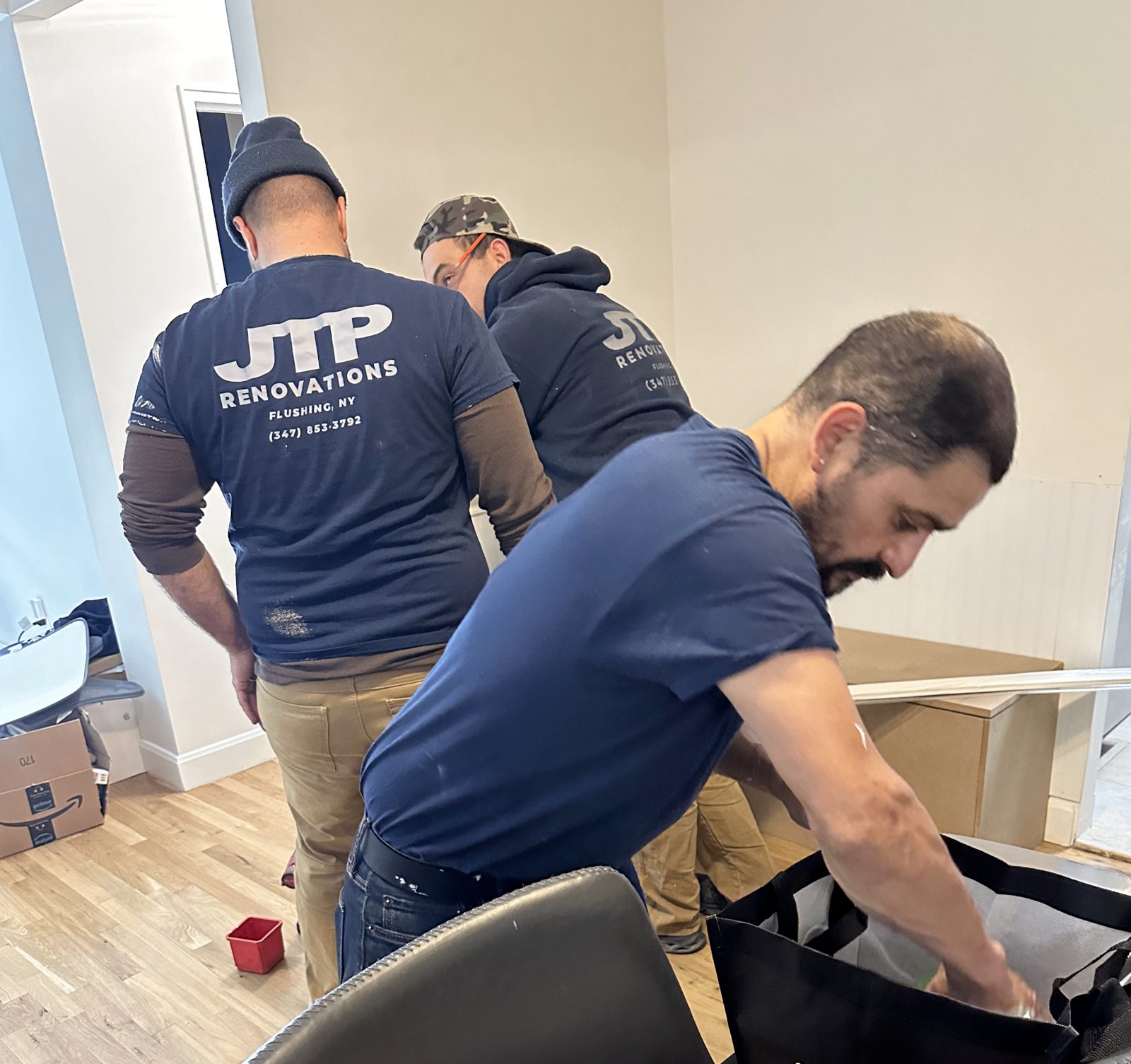 JTP Renovations crew working on-site during an interior renovation